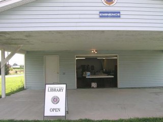 Front of Eminence branch library with "Library Open" sign.