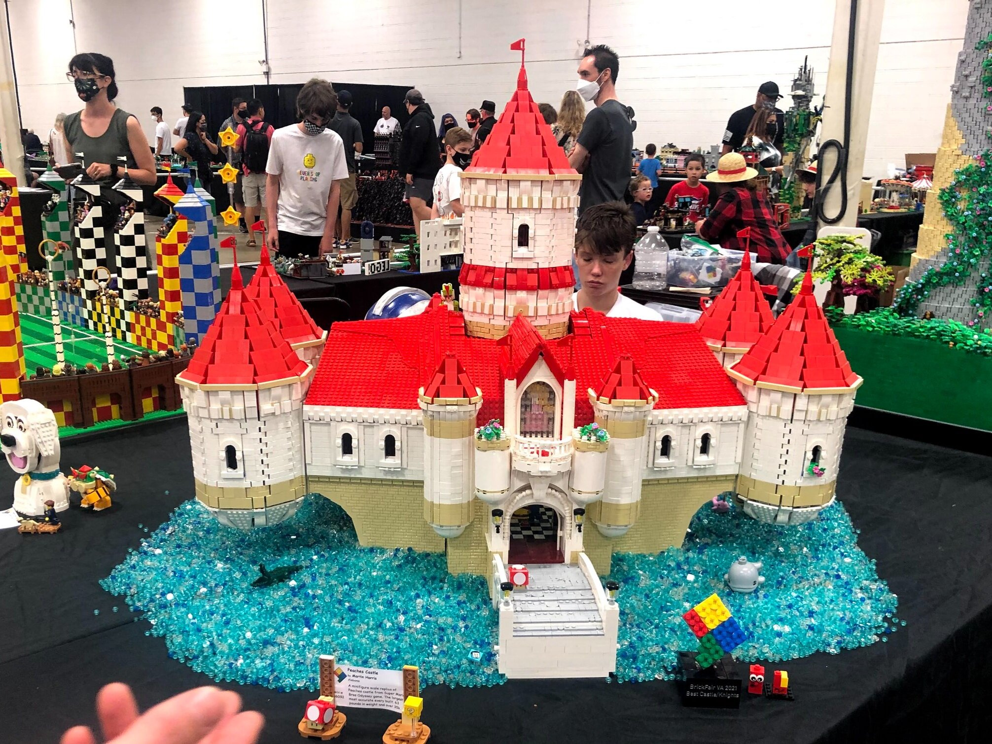 a lego castle on display at an exhibition