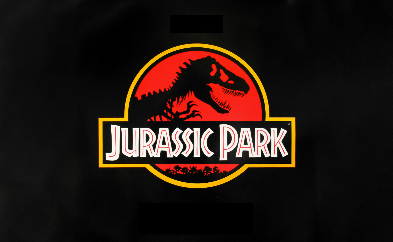 Black background with Jurassic Park logo, a t-rex skeleton.