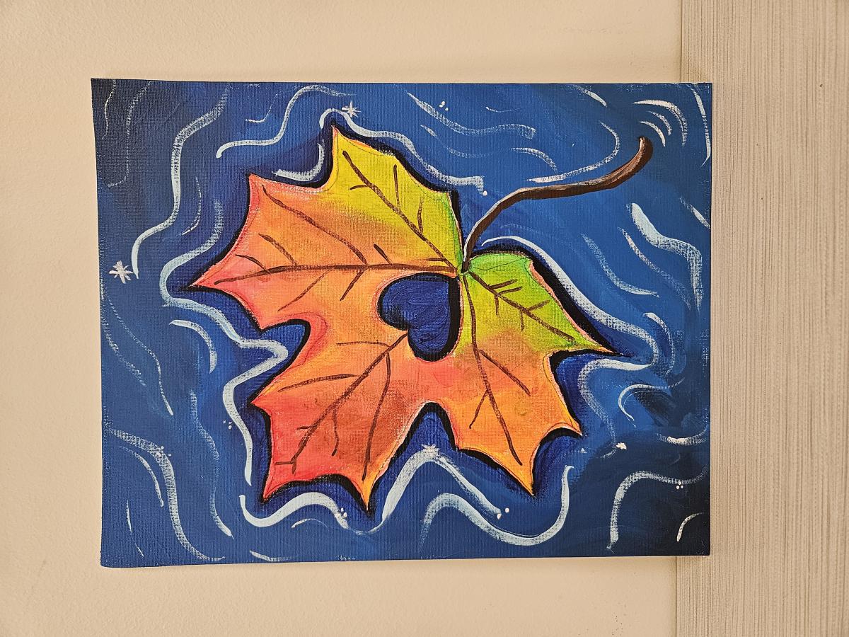 Painting of a fall leaf in water